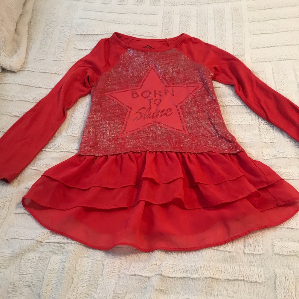 Long sleeve ruffle bottom shirt